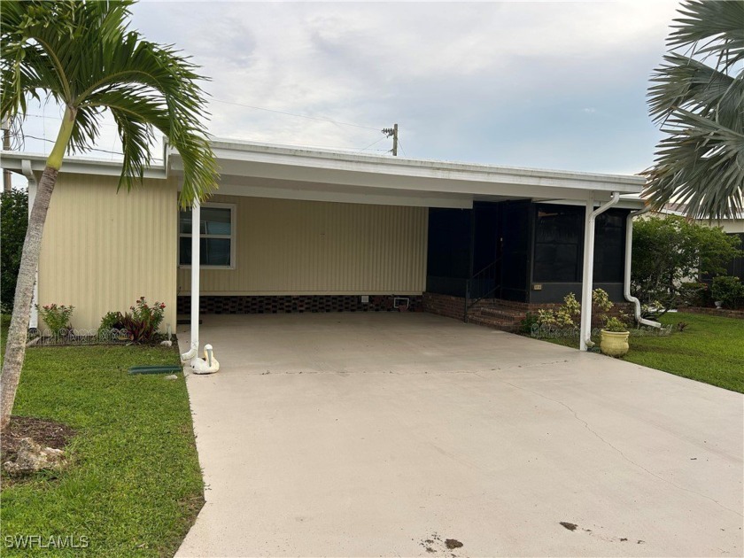 This nice well-maintained home located in highly desirable Lake - Beach Home for sale in North Fort Myers, Florida on Beachhouse.com