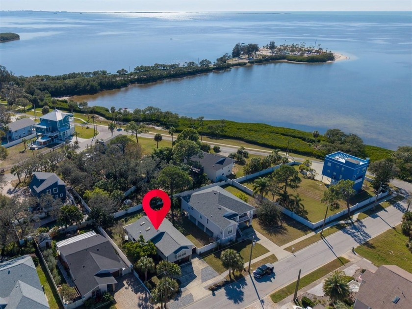 Watch breathtaking Gulf sunsets from your rear deck in this - Beach Home for sale in Tarpon Springs, Florida on Beachhouse.com