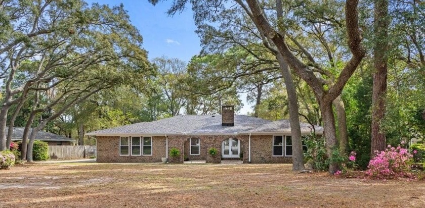 This beautiful 4/2 is situated in the charming Lake Lorraine - Beach Home for sale in Shalimar, Florida on Beachhouse.com