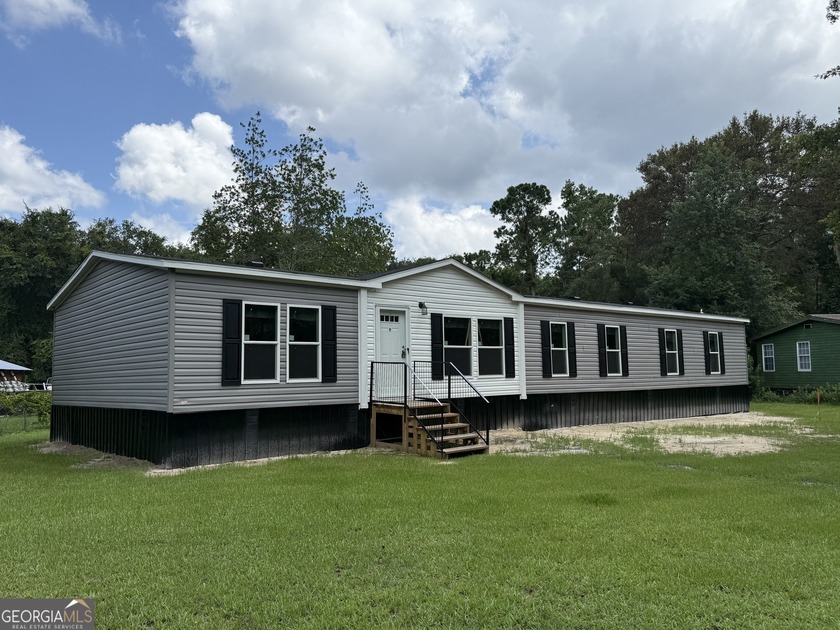You can be the first one to call this home! Lots of living space - Beach Home for sale in Woodbine, Georgia on Beachhouse.com