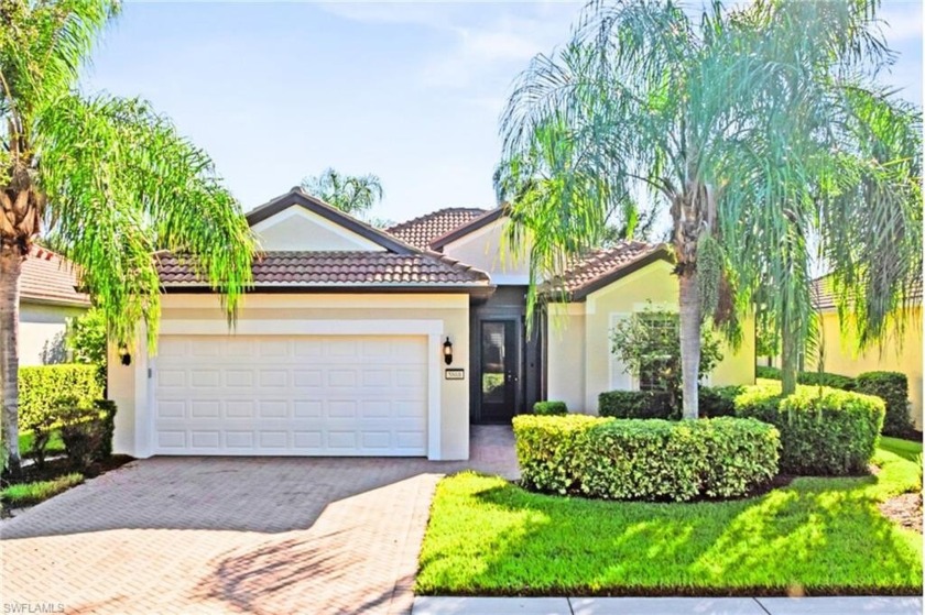 GOLF & WATER VIEWS! Step into this immaculate COPPER RIDGE floor - Beach Home for sale in Ave Maria, Florida on Beachhouse.com