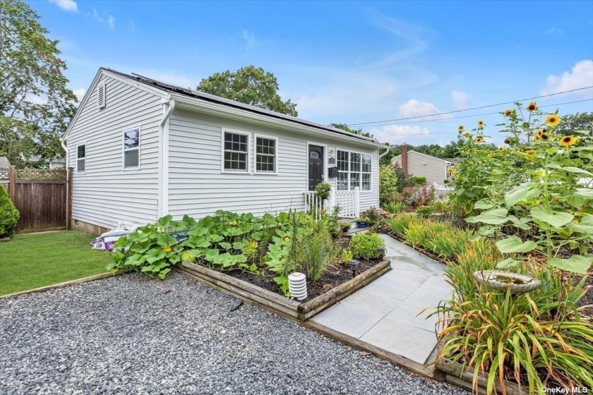 This super clean, quaint & affordable 2 bedroom ranch features - Beach Home for sale in Blue Point, New York on Beachhouse.com