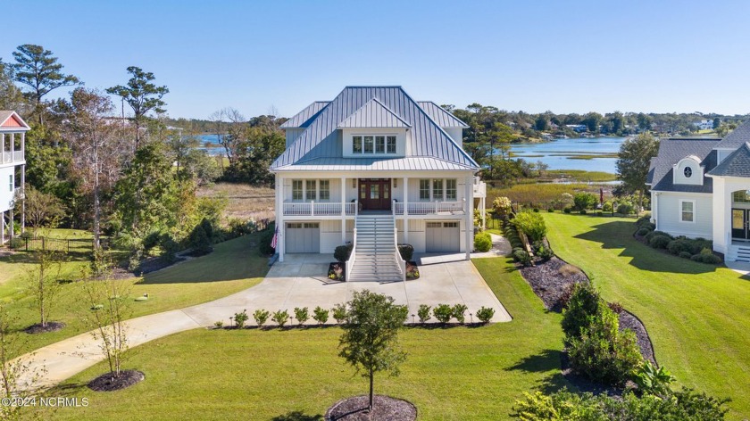 Step into a world of refined luxury at 361 Aster Place, an - Beach Home for sale in Hampstead, North Carolina on Beachhouse.com