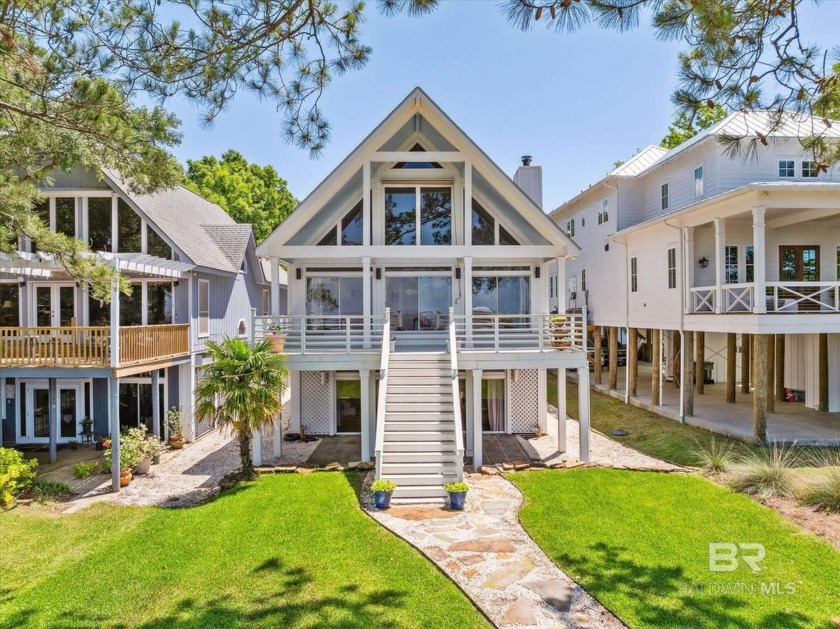 Discover the tranquil beauty of this Bay Front Contemporary Home - Beach Home for sale in Daphne, Alabama on Beachhouse.com