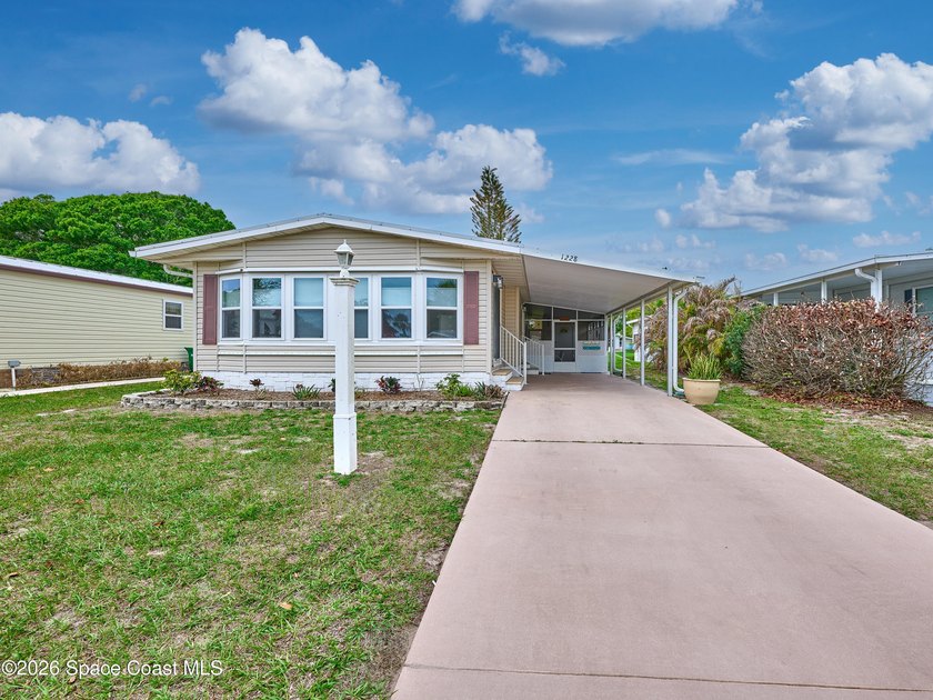 Beautifully updated home offering spacious, relaxed living with - Beach Home for sale in Barefoot Bay, Florida on Beachhouse.com