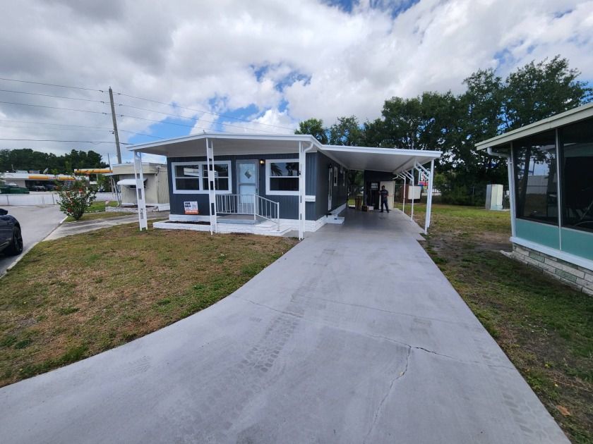 Located in Crystal Lake mobile home community with a lot rent of - Beach Home for sale in Pinellas Park, Florida on Beachhouse.com