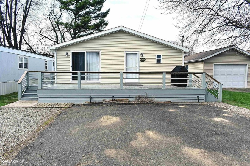 Super cute home on Beadle Island with Private beach access just - Beach Home for sale in Caseville, Michigan on Beachhouse.com
