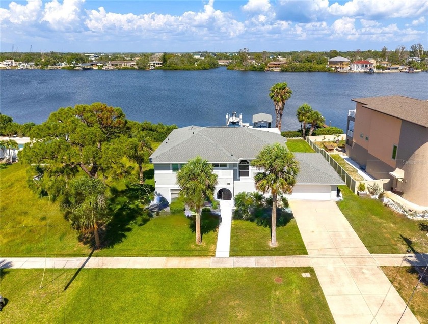 PRICED TO SELL = ENJOY FABULOUS SUNSETS & STUNNING VIEWS AT YOUR - Beach Home for sale in Tarpon Springs, Florida on Beachhouse.com