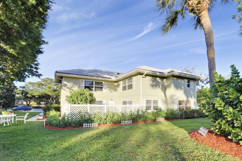 An abundance of natural light streams through the impact glass - Beach Townhome/Townhouse for sale in West Palm Beach, Florida on Beachhouse.com