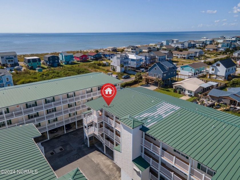 Enjoy stunning ocean views the moment you arrive at this - Beach Condo for sale in Oak Island, North Carolina on Beachhouse.com