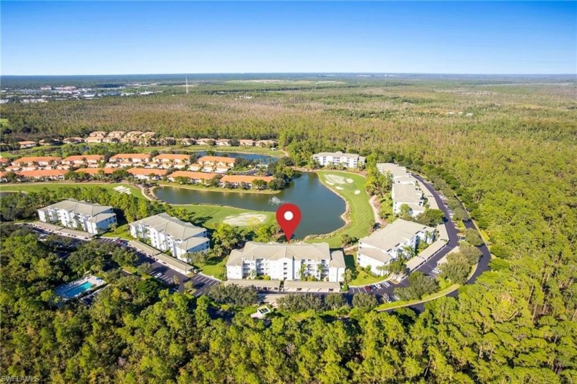 END UNIT WITH GOLF, LAKE VIEWS & PICKLEBALL ONSITE!! This - Beach Condo for sale in Naples, Florida on Beachhouse.com
