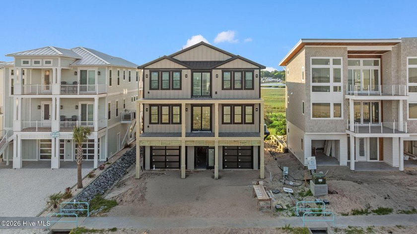 Perched in the highly-coveted gated community of The Pointe at - Beach Home for sale in Ocean Isle Beach, North Carolina on Beachhouse.com