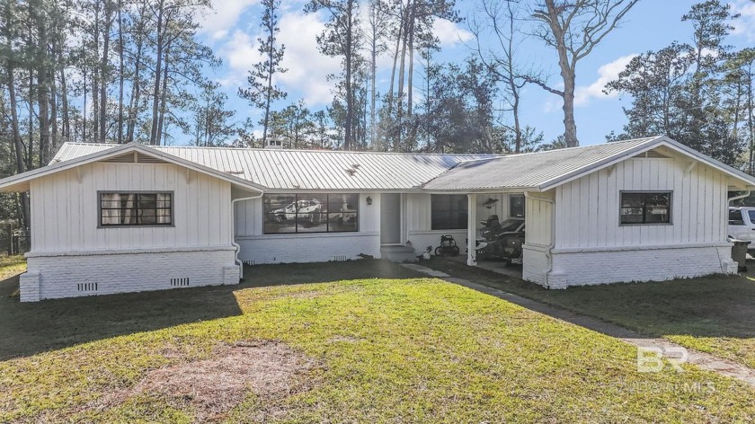 Nestled along serene waterways leading to the Bon Secour River - Beach Home for sale in Foley, Alabama on Beachhouse.com