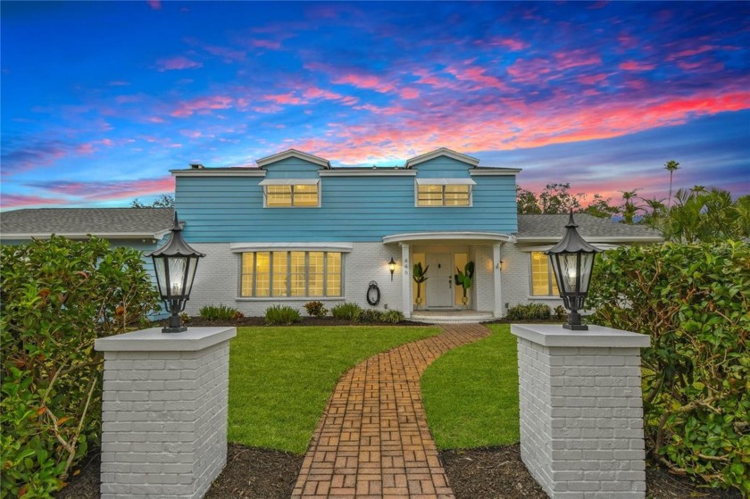 This exceptional home with a first-floor primary suite in - Beach Home for sale in Belleair Beach, Florida on Beachhouse.com