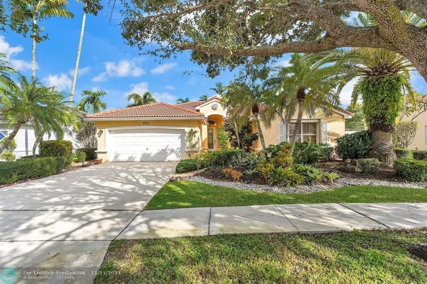 Nestled in the prestigious gated community of Keystone Lake with - Beach Home for sale in Pembroke Pines, Florida on Beachhouse.com