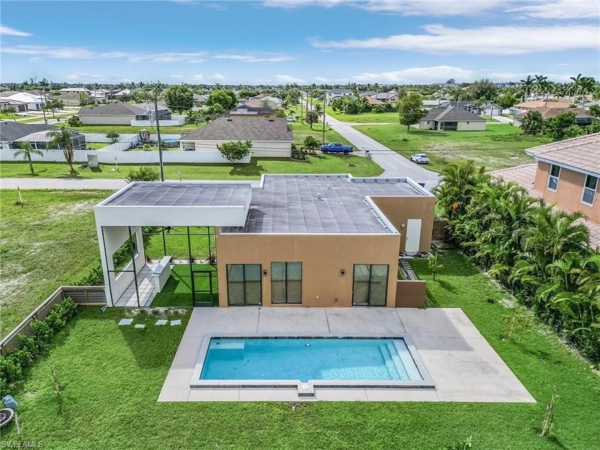 Welcome to 3923 SW 13th Ave, Cape Coral, FL 33914! This stunning - Beach Home for sale in Cape Coral, Florida on Beachhouse.com