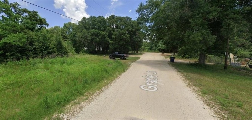 Nestled on a stunning 2+ acre flat lot just off Dawes Lake Road - Beach Acreage for sale in Mobile, Alabama on Beachhouse.com