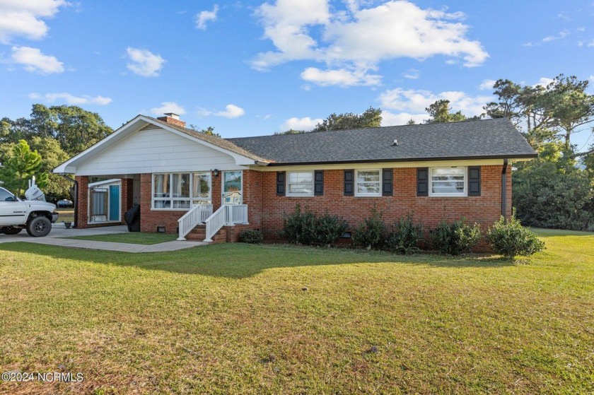 Ready for island living?? This large brick ranch home, nestled - Beach Home for sale in Harkers Island, North Carolina on Beachhouse.com