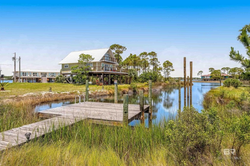 5 bedroom 3 bath home on Little Lagoon just a short walk to the - Beach Home for sale in Gulf Shores, Alabama on Beachhouse.com