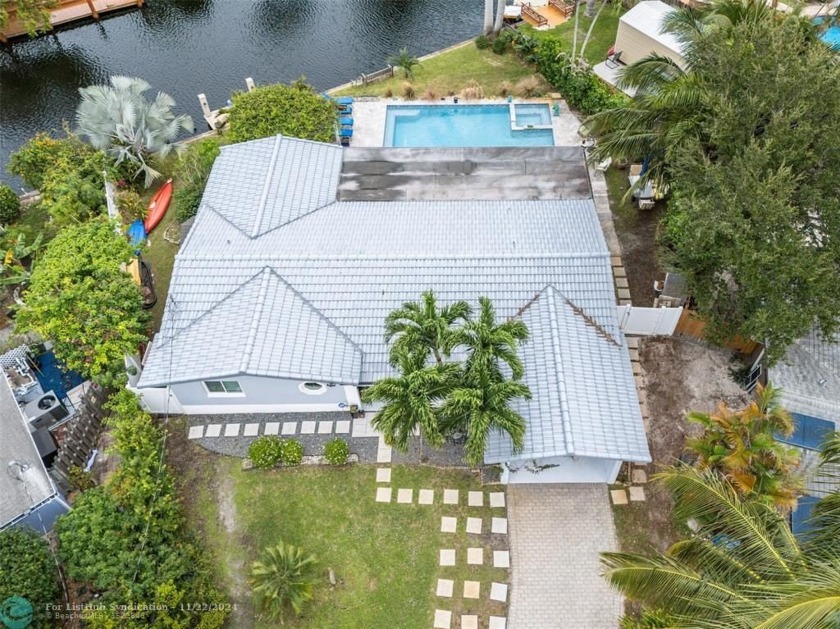 Your waterfront oasis awaits! This canal-front home offers ocean - Beach Home for sale in Fort Lauderdale, Florida on Beachhouse.com