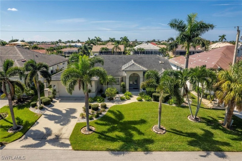 Welcome to your waterfront paradise in Punta Gorda Isles! This - Beach Home for sale in Punta Gorda, Florida on Beachhouse.com