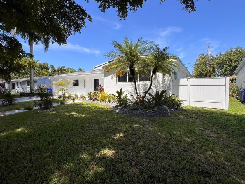 Spectacular family home! Featuring 3 bedrooms 2 bath one car - Beach Home for sale in North Miami Beach, Florida on Beachhouse.com