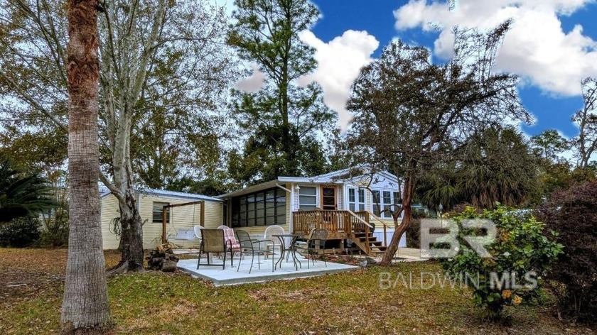 This Cozy Cottage in the much desired Spanish Cove subdivision - Beach Home for sale in Lillian, Alabama on Beachhouse.com