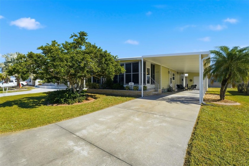 Your tropical retreat awaits in this 2-bedroom, 2-bathroom home - Beach Home for sale in North Port, Florida on Beachhouse.com