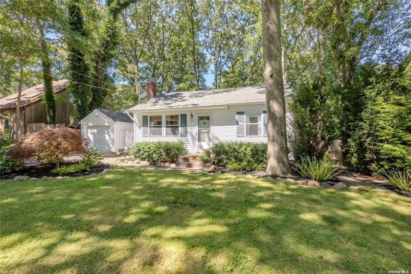 Welcome to this charming single-story home in Lake Panamoka - Beach Home for sale in Ridge, New York on Beachhouse.com