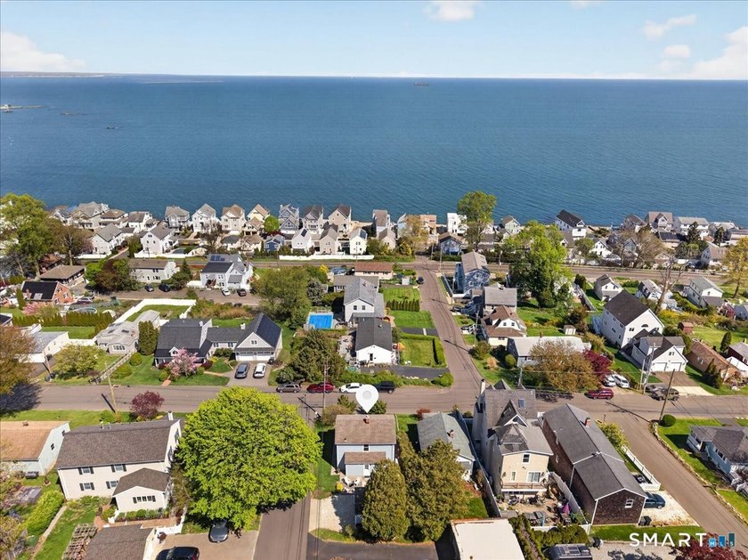 AMAZING WATER VIEWS! Set in a prime Woodmont location, this - Beach Home for sale in Milford, Connecticut on Beachhouse.com