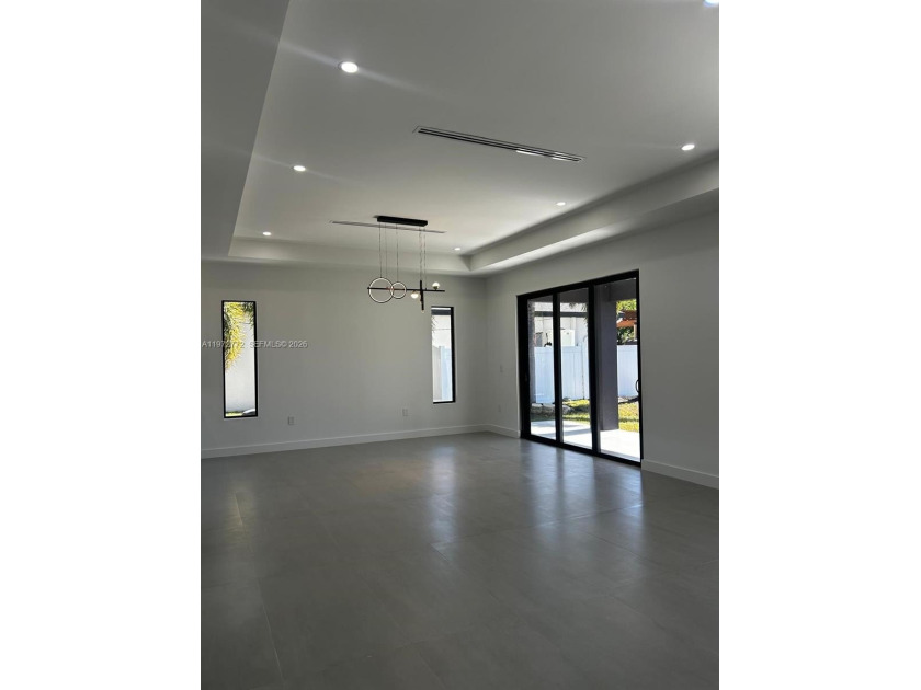 This brand-new modern home offers 3 bedrooms, 3 bathrooms, and - Beach Home for sale in Cape Coral, Florida on Beachhouse.com