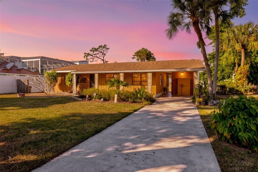 This single-family home sits on over a third of an acre just - Beach Home for sale in Nokomis, Florida on Beachhouse.com