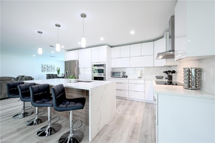 Offered turnkey furnished, this 3 bedroom, 2 bath home sits on a - Beach Home for sale in Naples, Florida on Beachhouse.com