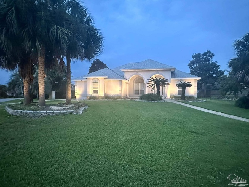 This beautifully maintained South Florida-style home in - Beach Home for sale in Pensacola, Florida on Beachhouse.com