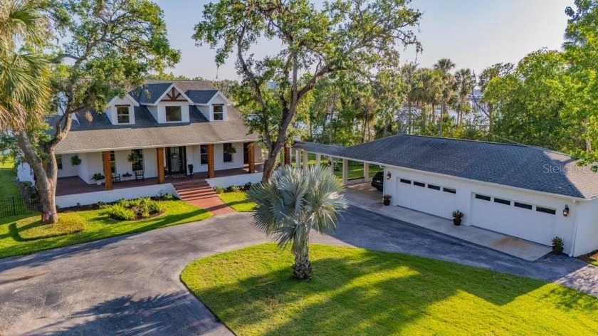 WATERFRONT DREAM HOME ON NEARLY ONE ACRE! A Park- Like Setting - Beach Home for sale in Riverview, Florida on Beachhouse.com
