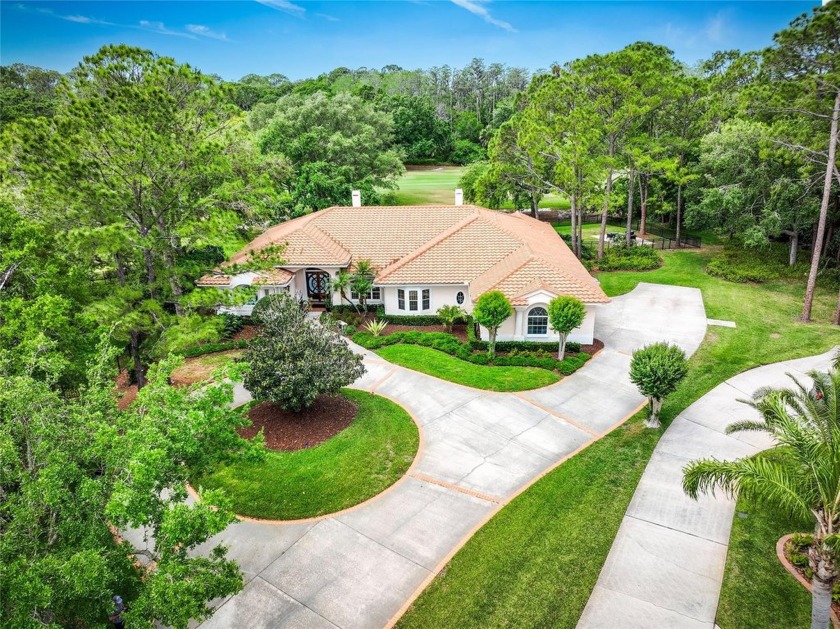 SPECTACULAR GOLF COURSE VIEW! Live on a quiet street in the - Beach Home for sale in Oldsmar, Florida on Beachhouse.com