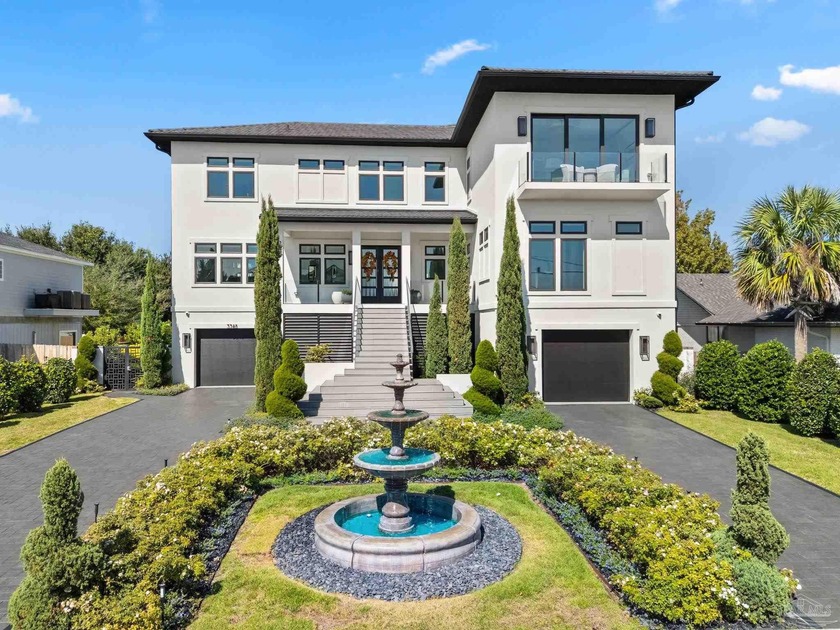 Experience modern coastal elegance in this architecturally - Beach Home for sale in Gulf Breeze, Florida on Beachhouse.com