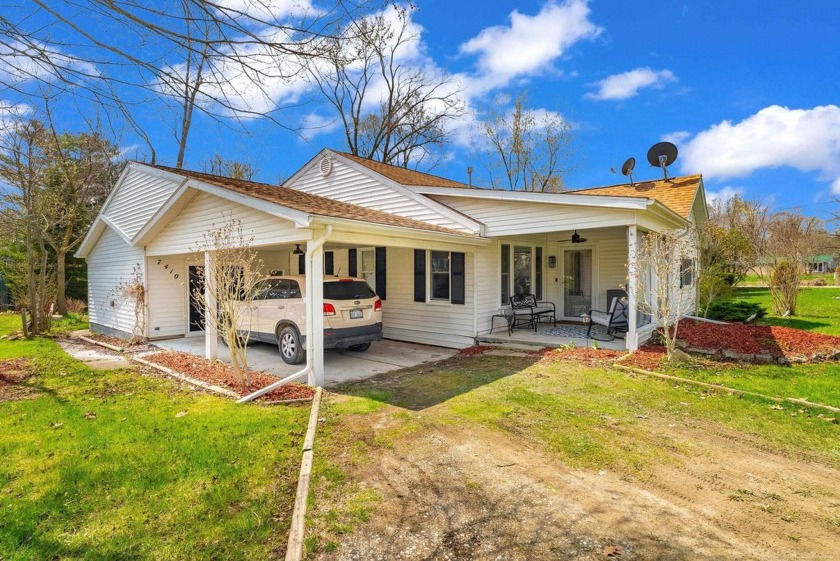 Charming Lakeside Getaway! Enjoy over 1,400 square feet of - Beach Home for sale in Lexington, Michigan on Beachhouse.com