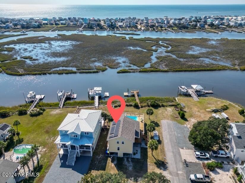 Welcome to waterfront living on Big Davis Canal! Looking out - Beach Home for sale in Oak Island, North Carolina on Beachhouse.com