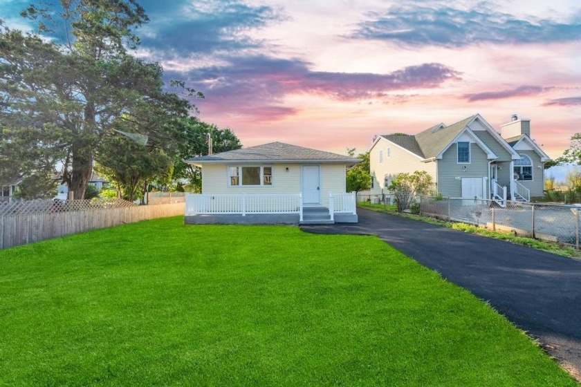 Welcome to your dream home! This beautifully renovated - Beach Home for sale in Shirley, New York on Beachhouse.com