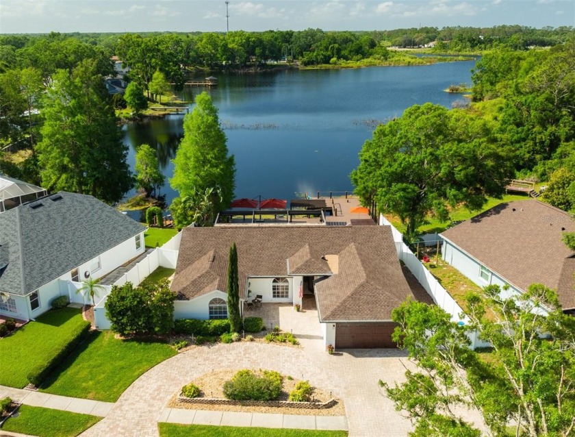 WELCOME HOME LAKE LOVERS - THIS ONE'S FOR YOU! Sitting on a - Beach Home for sale in Land O Lakes, Florida on Beachhouse.com