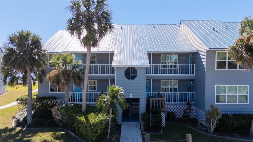 Perched over the sparkling waters of Charlotte Harbor, this bold - Beach Condo for sale in Port Charlotte, Florida on Beachhouse.com