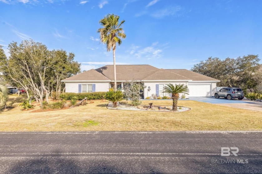 Discover coastal living at its finest in this charming 3-bedroom - Beach Home for sale in Orange Beach, Alabama on Beachhouse.com