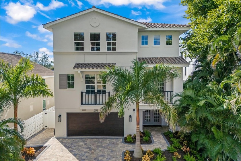 Tucked beyond a newly installed private gate and framed by fresh - Beach Home for sale in Sarasota, Florida on Beachhouse.com