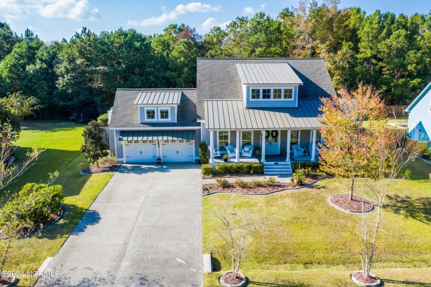 Welcome to this enchanted and custom-built gem by Chris Martin - Beach Home for sale in Hampstead, North Carolina on Beachhouse.com