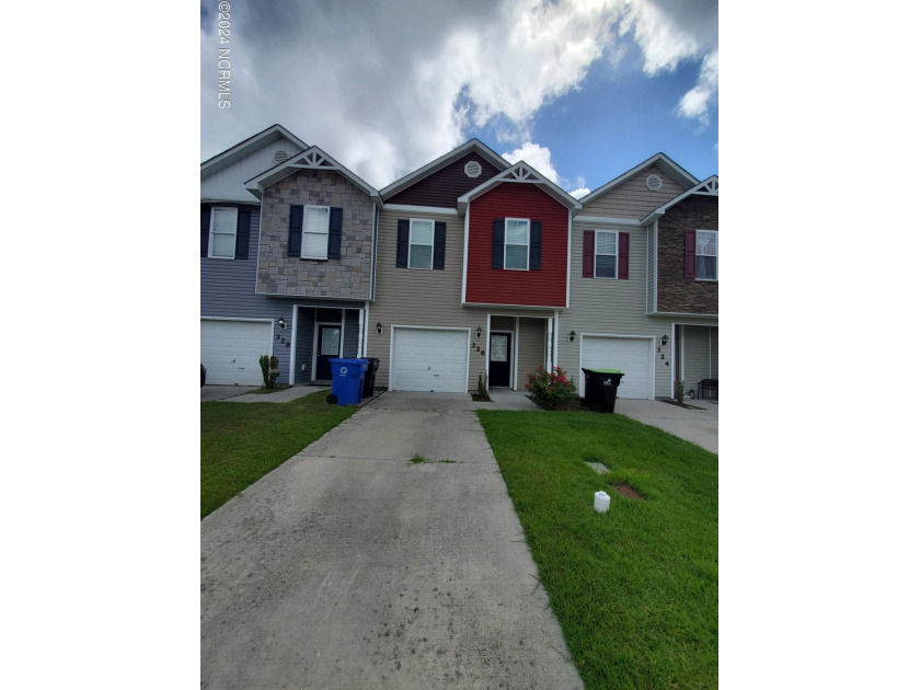 Motivated Seller! Great investment property or first home. Three - Beach Townhome/Townhouse for sale in Holly Ridge, North Carolina on Beachhouse.com