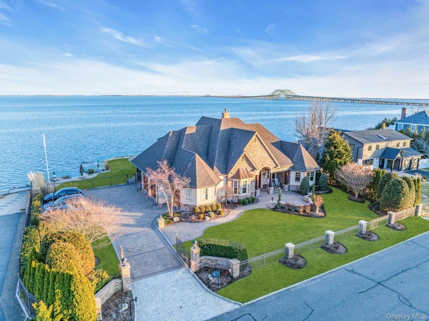West Islip | Oak Neck Estates | Bayfront Brick Colonial Welcome - Beach Home for sale in West Islip, New York on Beachhouse.com