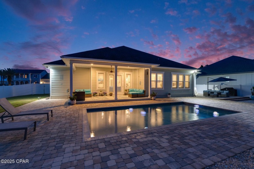 Nestled within the gated Dolphin Bay community, 906 Dolphin - Beach Home for sale in Panama City Beach, Florida on Beachhouse.com