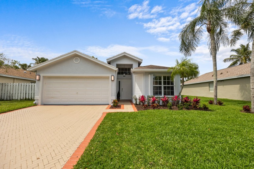 Welcome to your new home in the prestigious gated community with - Beach Home for sale in Greenacres, Florida on Beachhouse.com