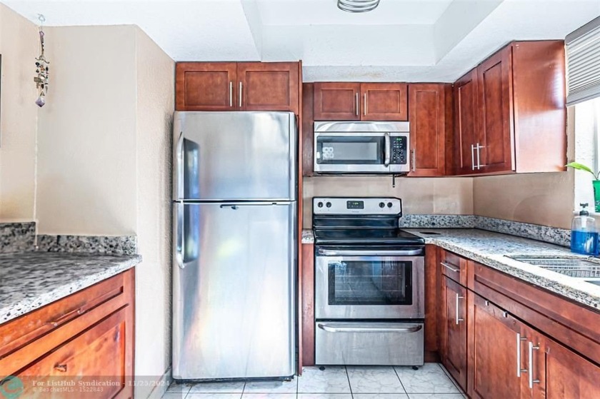 Discover this spacious 2-bedroom, 1.5-bath townhouse in the - Beach Condo for sale in Pompano Beach, Florida on Beachhouse.com